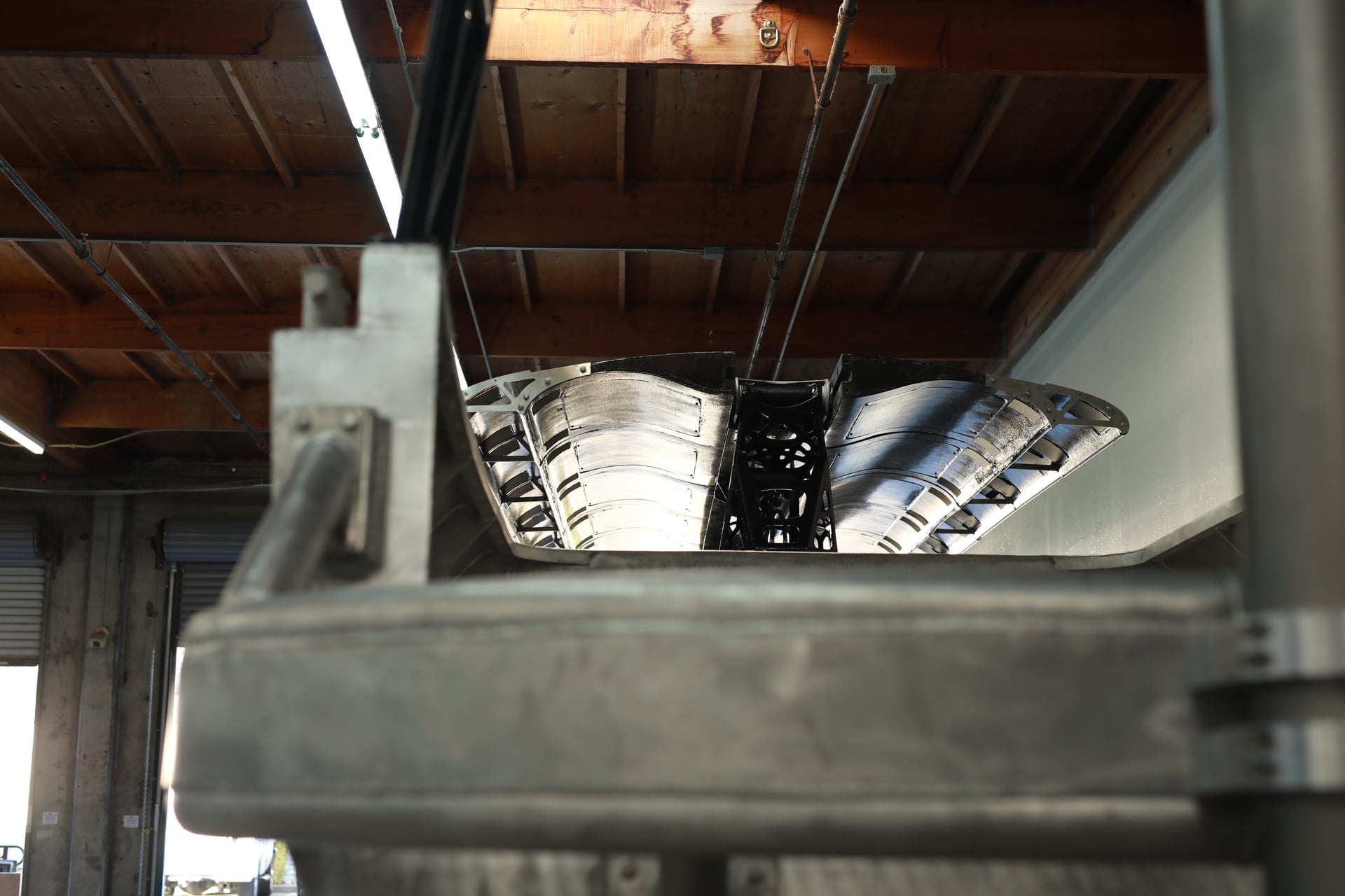 Curved aluminum panels and internal framing in the workshop